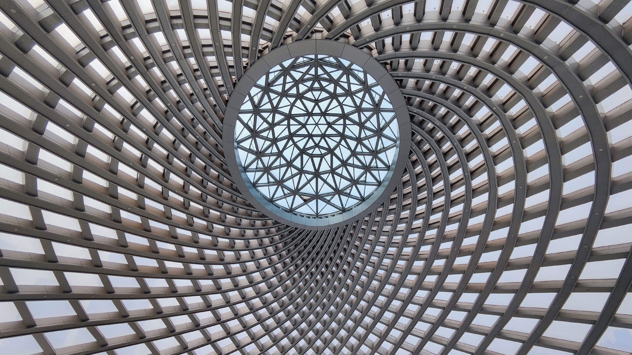 Binhai Railway Station: ETFE air cushions illuminate the column-free underground rail hub.